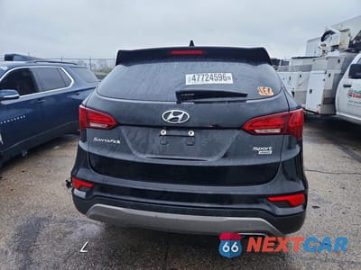 Zdjęcie 6 z 12 samochodu: 2018 HYUNDAI SANTA FE SPORT 2.4L VIN:5NMZUDLB2JH062274 - miniatura