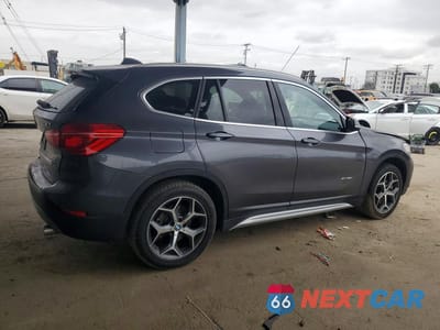 Trzecie zdjęcie samochodu z tyłu: 2018 BMW X1 XDRIVE28I VIN:WBXHT3Z39J4A66331 - miniatura