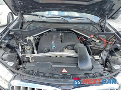 Zdjęcie 12 z 13 samochodu: 2014 BMW X5 XDRIVE35I VIN:5UXKR0C57E0H27893 - miniatura
