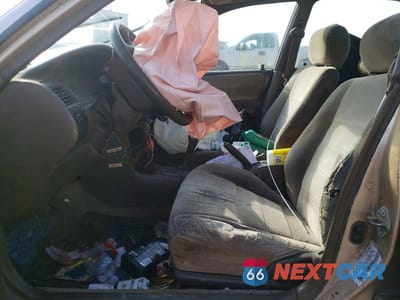 Zdjęcie 7 z 12 samochodu: 1997 TOYOTA COROLLA DX VIN:1NXBB02E9VZ596488 - miniatura