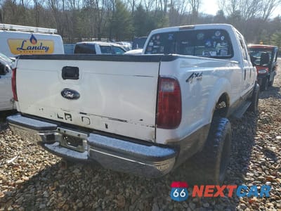 Trzecie zdjęcie samochodu z tyłu: 1999 FORD F250 SUPER DUTY VIN:1FTNW21F4XEE26483 - miniatura