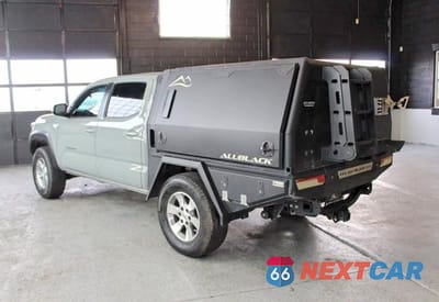 Czwarte zdjęcie samochodu z boku: 2022 TOYOTA TACOMA TRD OFF-ROAD VIN:3TMCZ5AN8NM532157 - miniatura