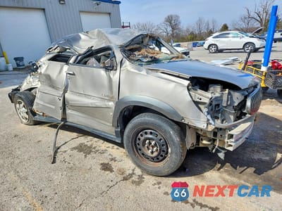 Czwarte zdjęcie samochodu z boku: 2002 BUICK RENDEZVOUS CX VIN:3G5DA03E62S570917 - miniatura