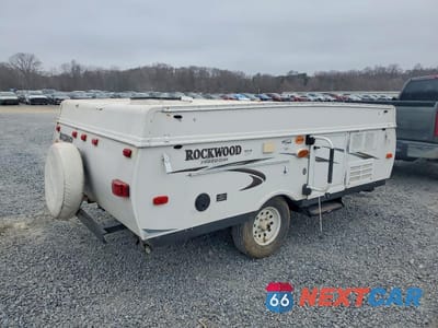 Czwarte zdjęcie samochodu z boku: 2014 FOREST RIVER ROCKWOOD FREEDOM TENT CAMPER VIN:4X4CFM411ED291348 - miniatura