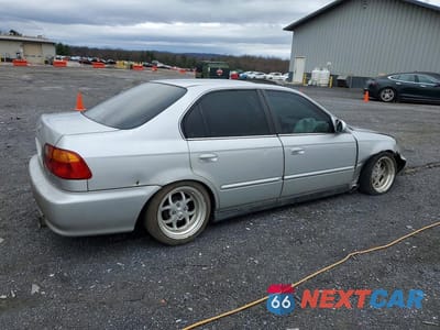 Trzecie zdjęcie samochodu z tyłu: 1999 HONDA CIVIC EX VIN:1HGEJ8544XL037799 - miniatura
