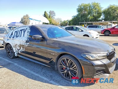 Czwarte zdjęcie samochodu z boku: 2023 BMW 530E VIN:WBA13AG07PCM41749 - miniatura