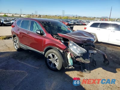 Czwarte zdjęcie samochodu z boku: 2017 HONDA CR-V LX VIN:7FARW5H38HE014683 - miniatura