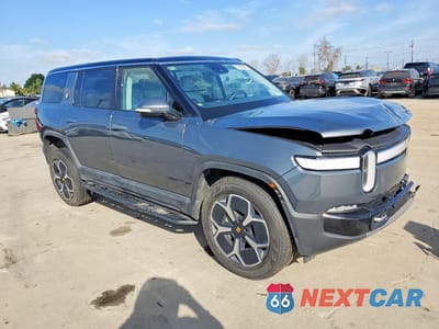 Czwarte zdjęcie samochodu z boku: 2024 RIVIAN R1S ADVENTURE VIN:7PDSGCBA3RN030064 - miniatura