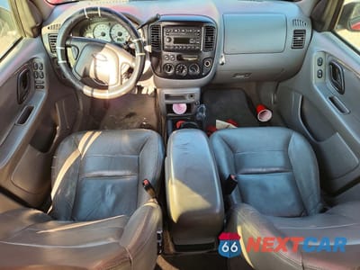 Zdjęcie 8 z 14 samochodu: 2001 FORD ESCAPE XLT VIN:1FMYU03171KE82205 - miniatura