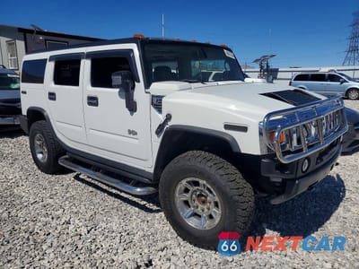 Czwarte zdjęcie samochodu z boku: 2006 HUMMER H2 VIN:5GRGN23U46H107619 - miniatura