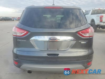 Zdjęcie 6 z 13 samochodu: 2016 FORD ESCAPE TITANIUM VIN:1FMCU9JX5GUB54669 - miniatura