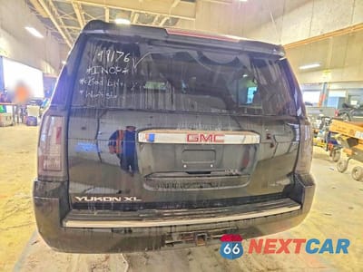 Zdjęcie 6 z 12 samochodu: 2015 GMC YUKON XL DENALI VIN:1GKS2JKJ2FR149176 - miniatura