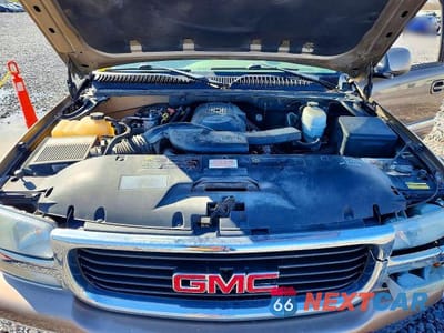 Zdjęcie 11 z 12 samochodu: 2004 GMC YUKON VIN:1GKEK13Z44J257215 - miniatura