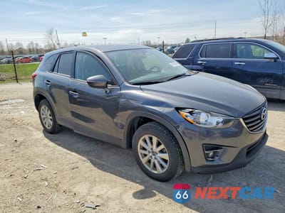 Czwarte zdjęcie samochodu z boku: 2016 MAZDA CX-5 TOURING VIN:JM3KE4CY8G0720229 - miniatura