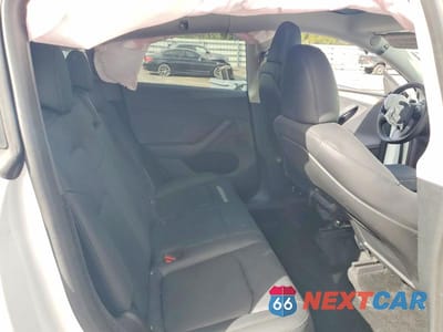 Zdjęcie 10 z 12 samochodu: 2023 TESLA MODEL Y VIN:7SAYGDEE7PA188182 - miniatura