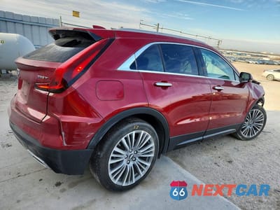 Trzecie zdjęcie samochodu z tyłu: 2024 CADILLAC XT4 PREMIUM LUXURY VIN:1GYFZDR41RF167839 - miniatura