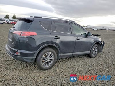 Trzecie zdjęcie samochodu z tyłu: 2018 TOYOTA RAV4 HYBRID XLE VIN:JTMRJREV4JD157327 - miniatura