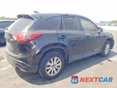 Trzecie zdjęcie samochodu z tyłu: 2016 MAZDA CX-5 TOURING VIN:JM3KE2CY1G0619313 - miniatura