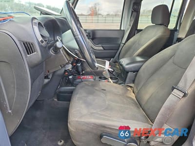 Zdjęcie 7 z 14 samochodu: 2015 JEEP WRANGLER UNLIMITED SPORT VIN:1C4BJWDG0FL742678 - miniatura