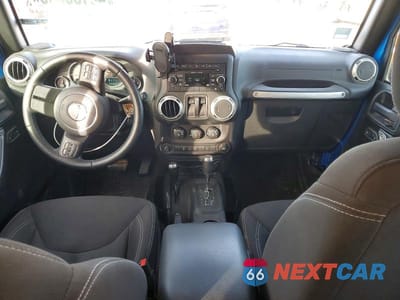 Zdjęcie 8 z 12 samochodu: 2016 JEEP WRANGLER SAHARA VIN:1C4AJWBG5GL140973 - miniatura