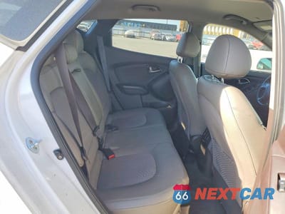 Zdjęcie 11 z 13 samochodu: 2014 HYUNDAI TUCSON VIN:KM8JU3AG0EU907431 - miniatura