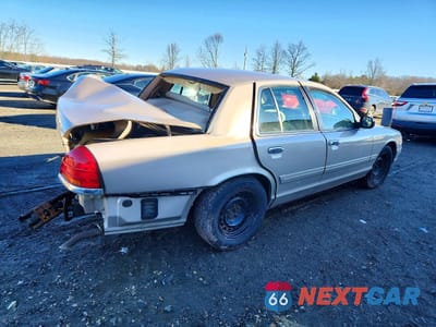 Trzecie zdjęcie samochodu z tyłu: 1998 FORD CROWN VICTORIA LX VIN:2FAFP74W9WX187901 - miniatura