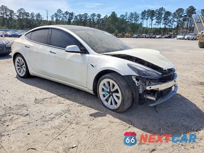 Czwarte zdjęcie samochodu z boku: 2021 TESLA MODEL 3 VIN:5YJ3E1EA4MF032219 - miniatura