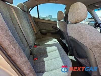 Zdjęcie 10 z 11 samochodu: 2002 HYUNDAI ELANTRA GLS VIN:KMHDN45D32U357864 - miniatura