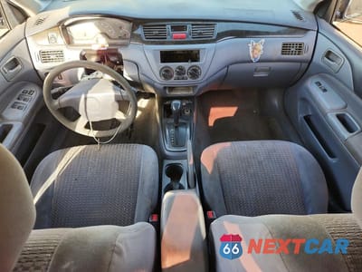 Zdjęcie 8 z 12 samochodu: 2002 MITSUBISHI LANCER ES VIN:JA3AJ26EX2U081602 - miniatura