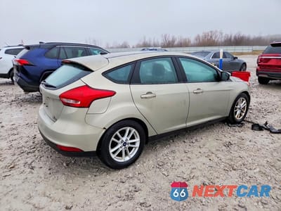 Trzecie zdjęcie samochodu z tyłu: 2016 FORD FOCUS SE VIN:1FADP3K20GL203904 - miniatura