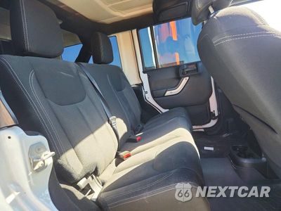 Zdjęcie 10 z 13 samochodu: 2015 JEEP WRANGLER UNLIMITED SAHARA VIN:1C4BJWEG8FL757864 - miniatura
