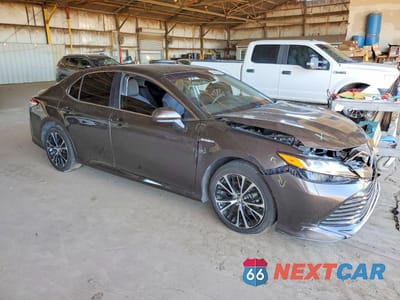 Czwarte zdjęcie samochodu z boku: 2019 TOYOTA CAMRY HYBRID LE VIN:4T1B31HK3KU005244 - miniatura