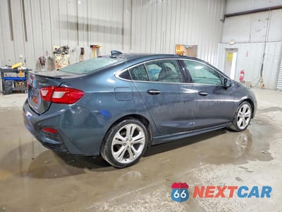 Trzecie zdjęcie samochodu z tyłu: 2017 CHEVROLET CRUZE PREMIER VIN:1G1BF5SM9H7275267 - miniatura