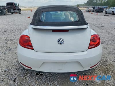Zdjęcie 6 z 12 samochodu: 2013 VOLKSWAGEN BEETLE VIN:3VW5P7ATXDM822632 - miniatura