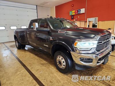 Czwarte zdjęcie samochodu z boku: 2022 RAM TRUCKS 3500 LARAMIE VIN:3C63RRJL1NG114664 - miniatura