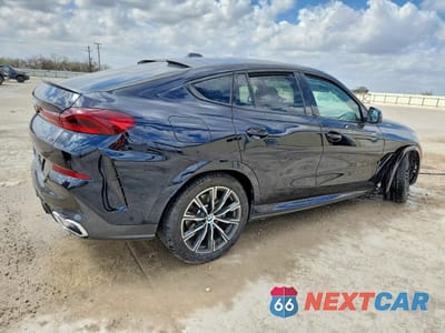 Trzecie zdjęcie samochodu z tyłu: 2026 BMW X6 XDRIVE40I VIN:5UX33EX02T9229141 - miniatura