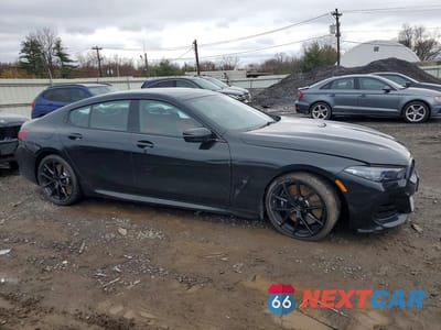 Czwarte zdjęcie samochodu z boku: 2026 BMW M850XI VIN:WBAGV8C02TCV85075 - miniatura