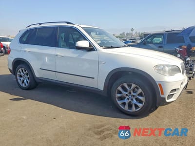Czwarte zdjęcie samochodu z boku: 2013 BMW X5 XDRIVE35I VIN:5UXZV4C56D0B11165 - miniatura