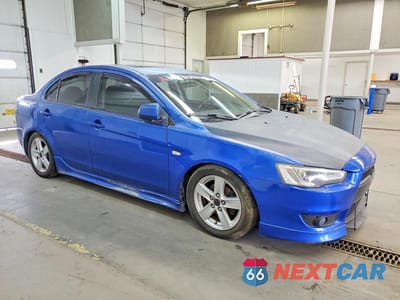 Czwarte zdjęcie samochodu z boku: 2009 MITSUBISHI LANCER ES VIN:JA3AU26U89U003392 - miniatura