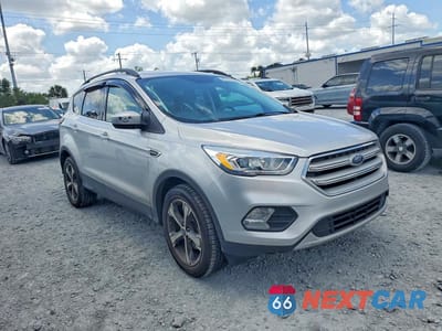 Czwarte zdjęcie samochodu z boku: 2018 FORD ESCAPE SEL VIN:1FMCU0HD0JUA79393 - miniatura