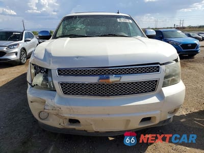 Piąte zdjęcie samochodu w środku: 2011 CHEVROLET SUBURBAN C1500 LTZ VIN:1GNSCKE04BR125612 - miniatura