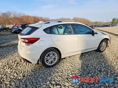 Trzecie zdjęcie samochodu z tyłu: 2017 SUBARU IMPREZA PREMIUM VIN:4S3GTAB61H3705977 - miniatura