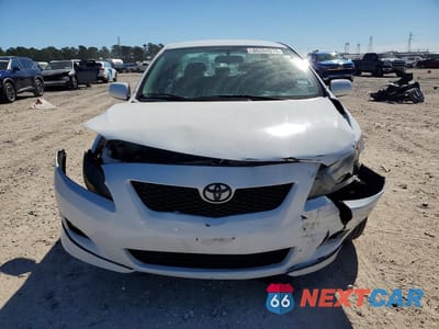 Piąte zdjęcie samochodu w środku: 2010 TOYOTA COROLLA BASE VIN:1NXBU4EE2AZ218763 - miniatura
