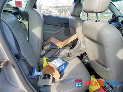 Zdjęcie 10 z 12 samochodu: 2005 FORD FOCUS ZX5 VIN:3FAFP37NX5R150378 - miniatura