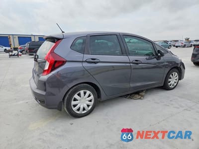 Trzecie zdjęcie samochodu z tyłu: 2019 HONDA FIT LX VIN:3HGGK5H49KM713770 - miniatura