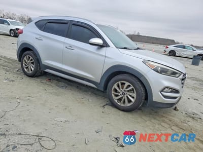 Czwarte zdjęcie samochodu z boku: 2017 HYUNDAI TUCSON SE PLUS VIN:KM8J33A49HU374590 - miniatura