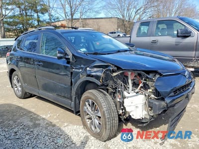 Czwarte zdjęcie samochodu z boku: 2017 TOYOTA RAV4 HYBRID XLE VIN:JTMRJREV5HD097309 - miniatura