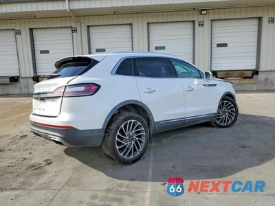 Trzecie zdjęcie samochodu z tyłu: 2020 LINCOLN NAUTILUS RESERVE VIN:2LMPJ8KP2LBL03465 - miniatura