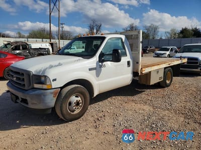 2002 FORD F350 SUPER DUTY FLATBED TRUCK 1FDWF36S62EA29507 - główne zdjęcie licytacji z USA - miniatura