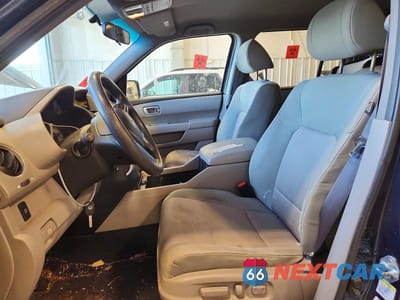 Zdjęcie 7 z 12 samochodu: 2011 HONDA PILOT EX VIN:5FNYF4H46BB008429 - miniatura